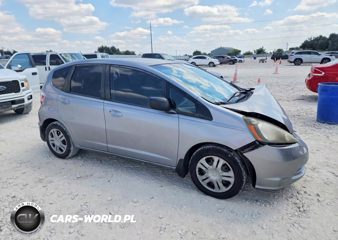 2009 Honda Fit VIN:JHMGE88299C002179 - 4