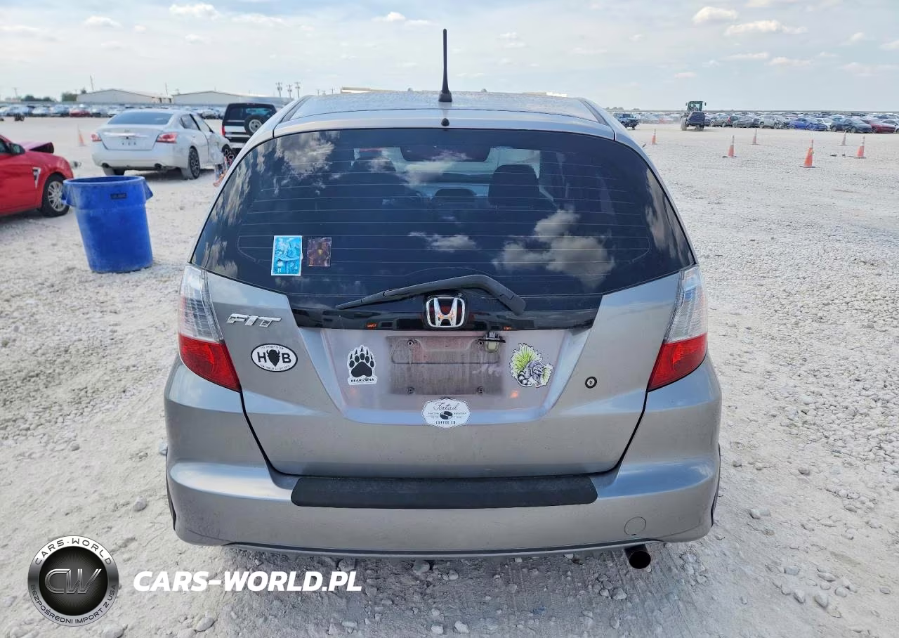 2009 Honda Fit VIN:JHMGE88299C002179 - 6