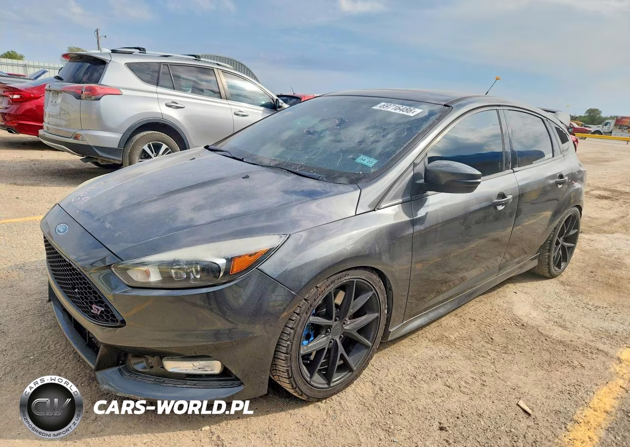 2018 Ford Focus VIN:1FADP3L92JL229780 - 1
