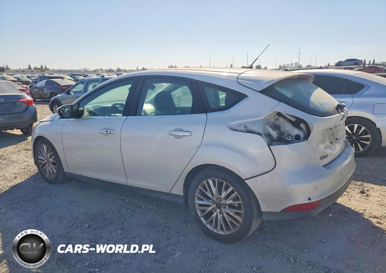 2015 Ford Focus Titanium VIN:1FADP3N21FL241667 - 2
