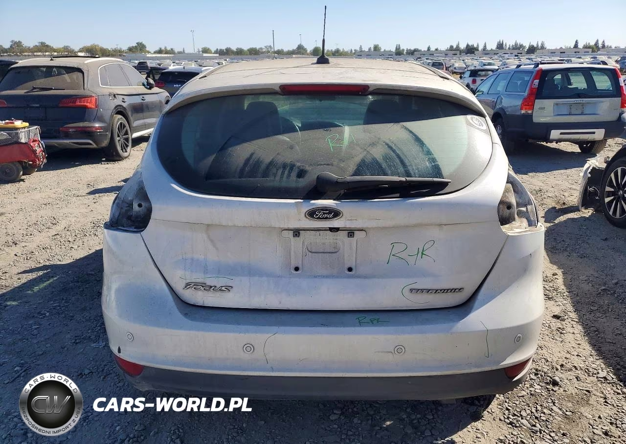 2015 Ford Focus Titanium VIN:1FADP3N21FL241667 - 6