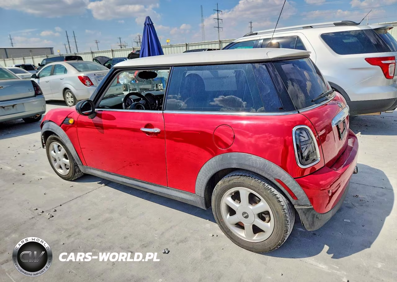 2009 Mini Cooper VIN:WMWMF33599TZ21327 - 2