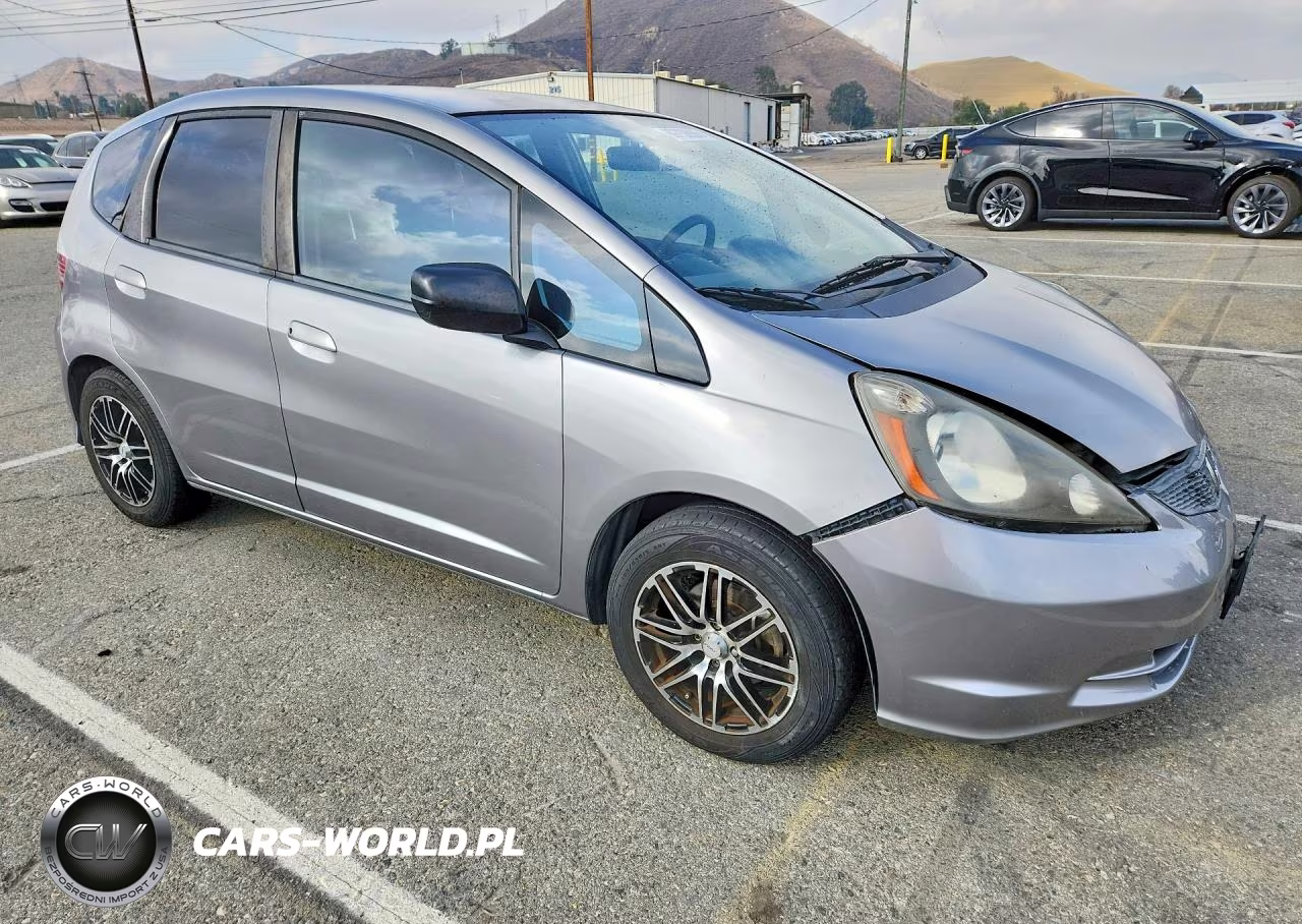 2010 Honda Fit VIN:JHMGE8H20AS007409 - 4