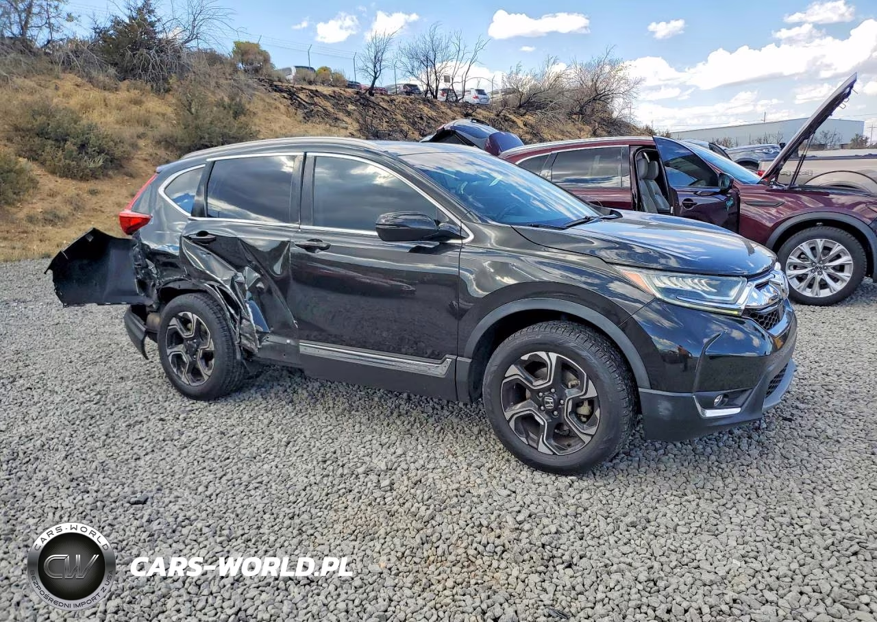 2019 Honda Cr-V Touring VIN:5J6RW2H98KL000053 - 4
