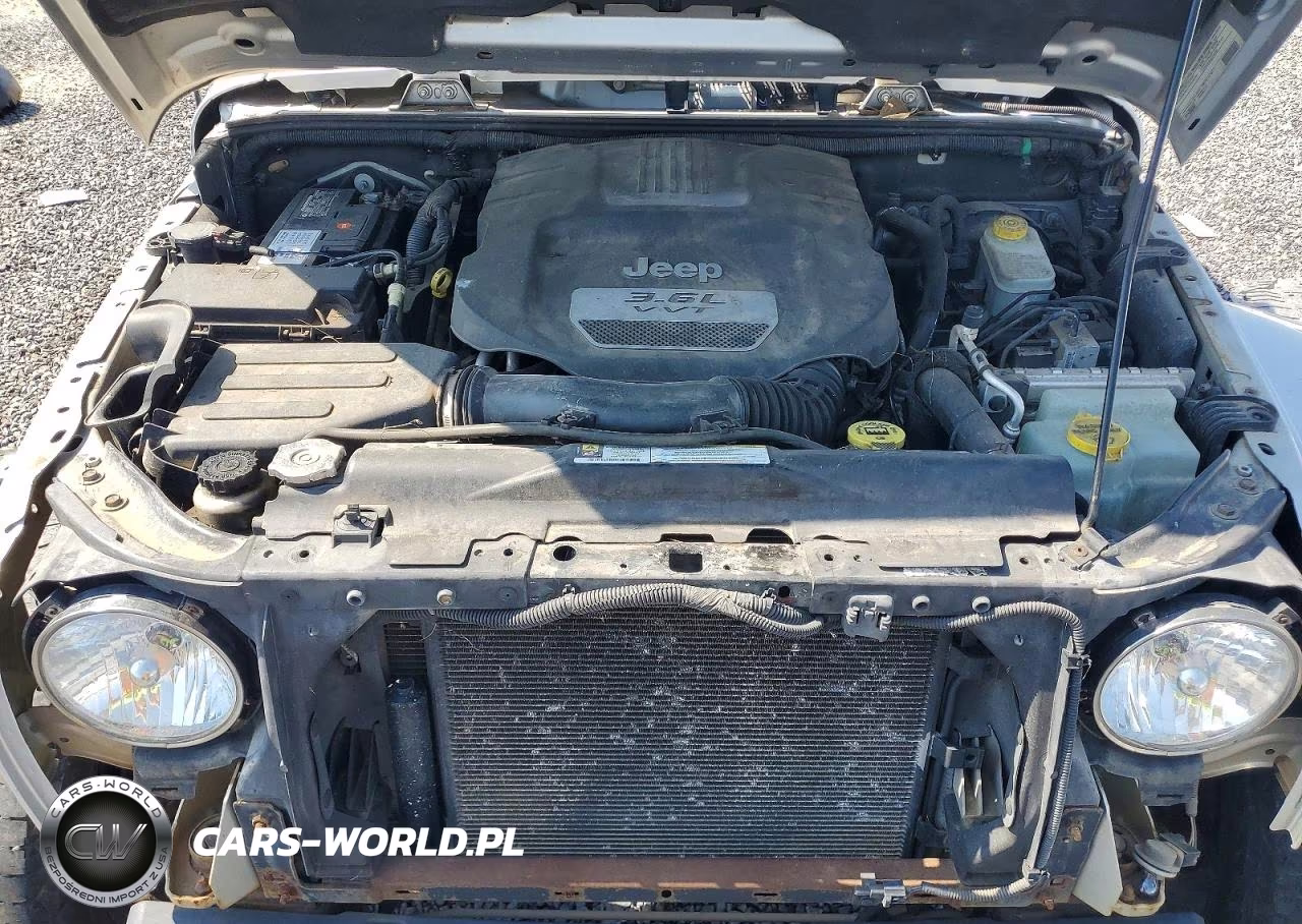 2012 Jeep Wrangler Unlimited Sahara VIN:1C4BJWEG0CL141264 - 11