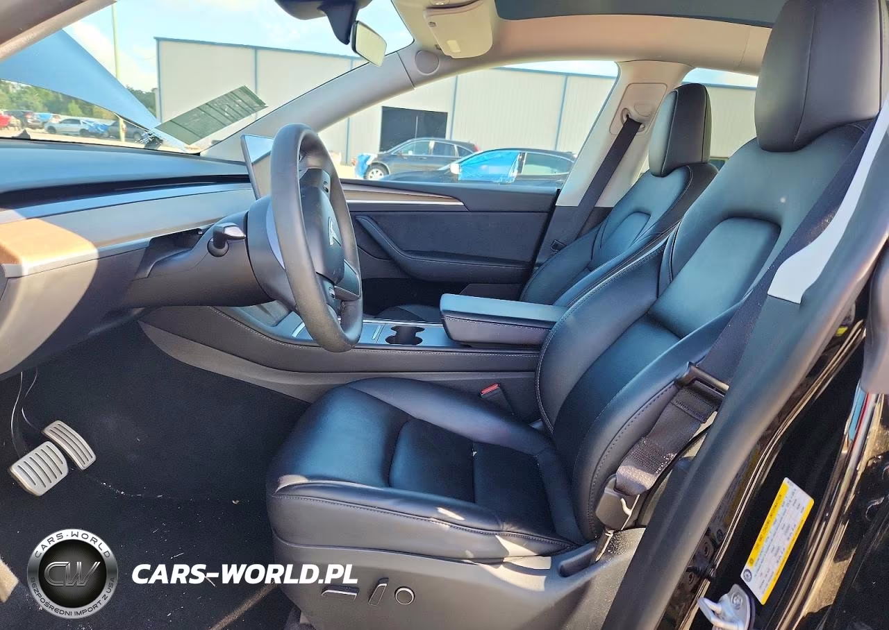2023 Tesla Model Y VIN:7SAYGDEFXPF941571 - 7