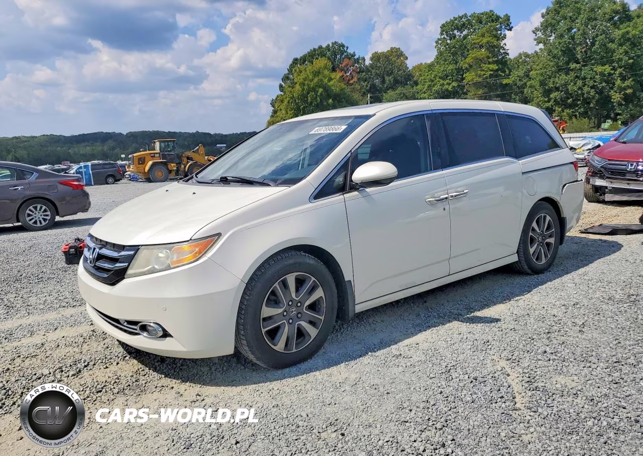 2016 Honda Odyssey Touring VIN:5FNRL5H92GB105035 - 1