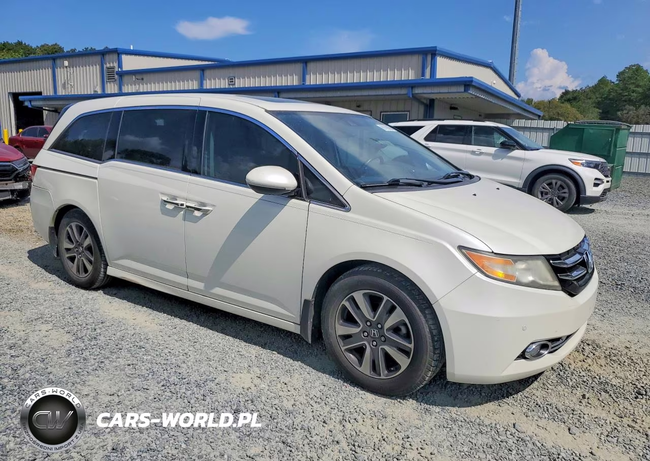 2016 Honda Odyssey Touring VIN:5FNRL5H92GB105035 - 4