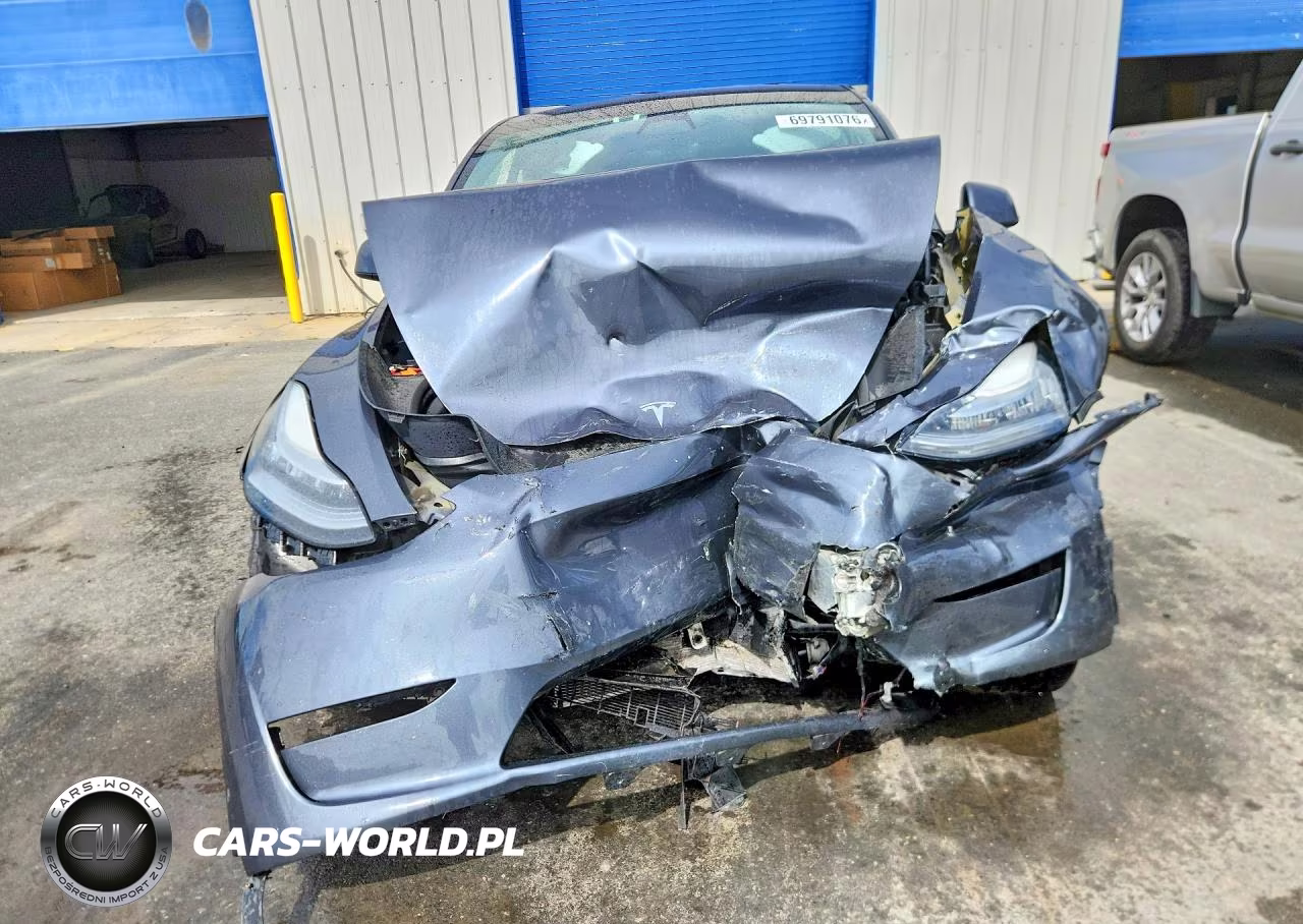 2023 Tesla Model Y VIN:7SAYGDEE0PA110102 - 5