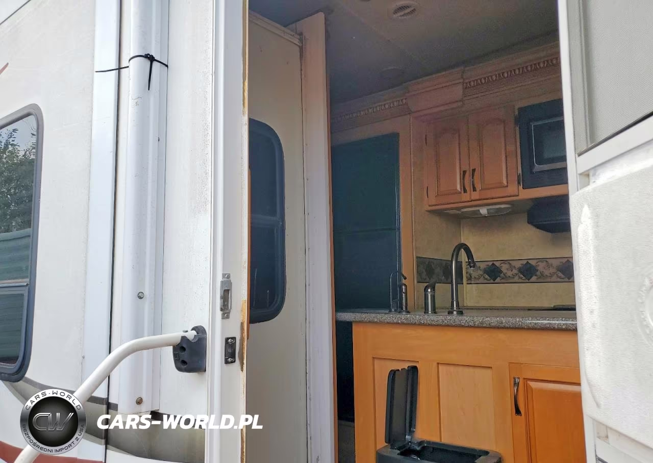 2010 Keystone Challenger Camper VIN:4YDF34S26AE750057 - 6