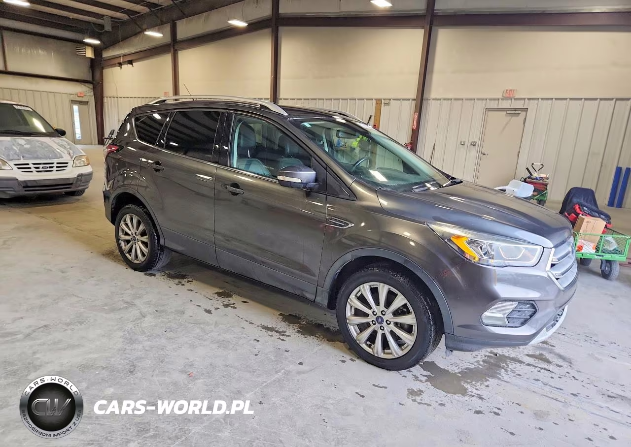 2017 Ford Escape Titanium VIN:1FMCU9J94HUD57989 - 4