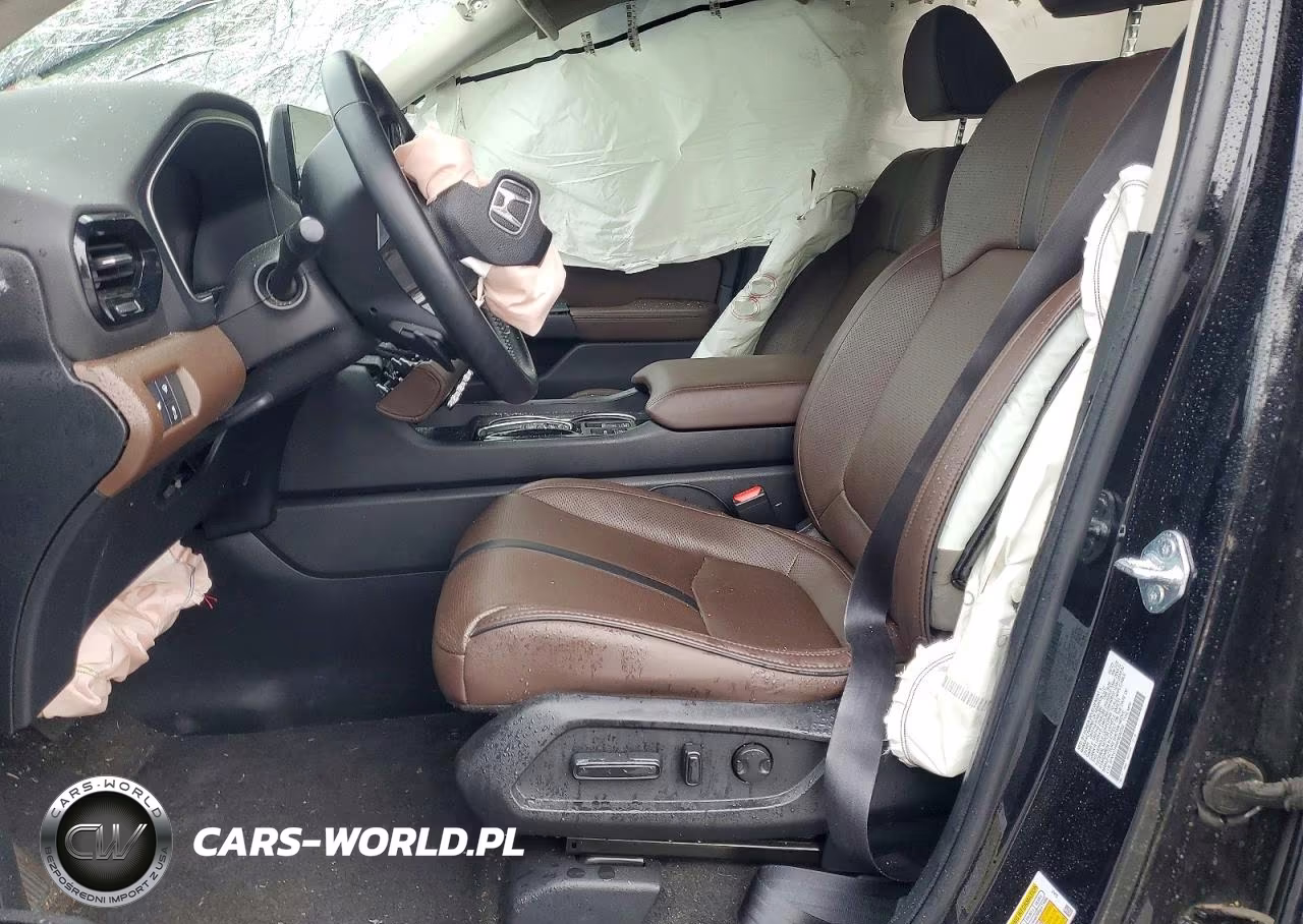 2023 Honda Pilot Elite VIN:5FNYG1H84PB040222 - 7