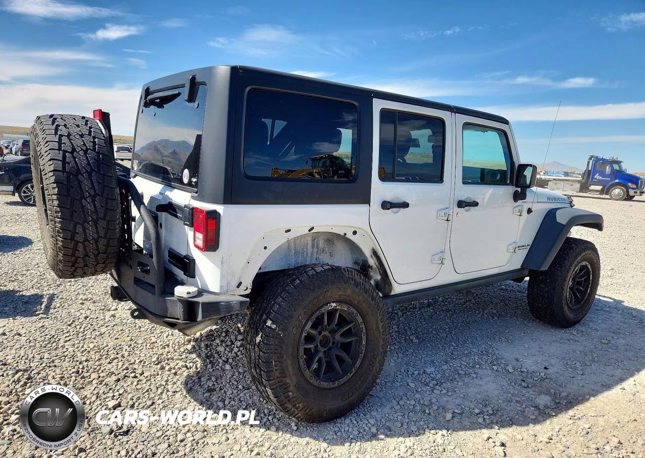 2015 Jeep Wrangler Unlimited Rubicon VIN:1C4BJWFG1FL699868 - 3