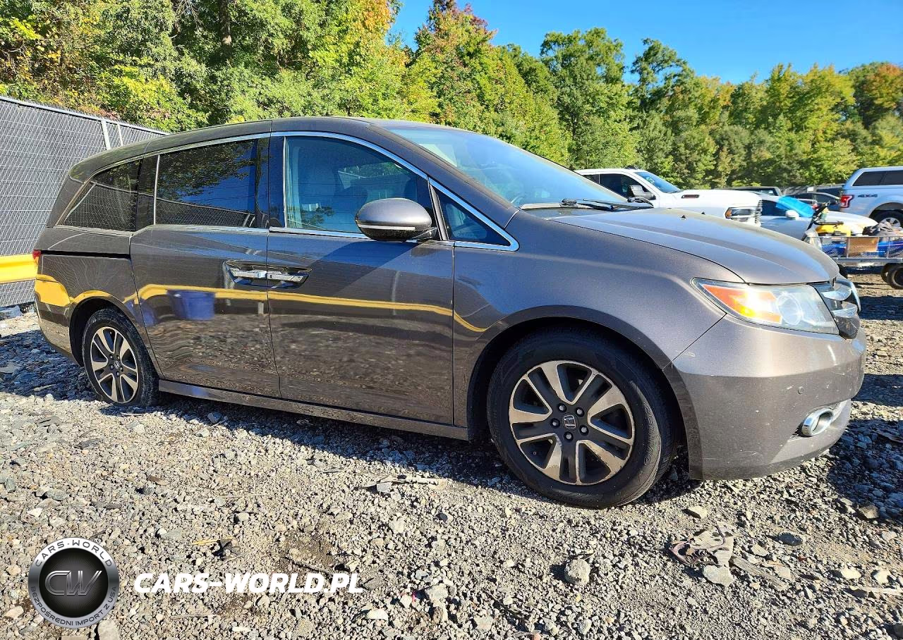 2015 Honda Odyssey Touring VIN:5FNRL5H99FB115446 - 4