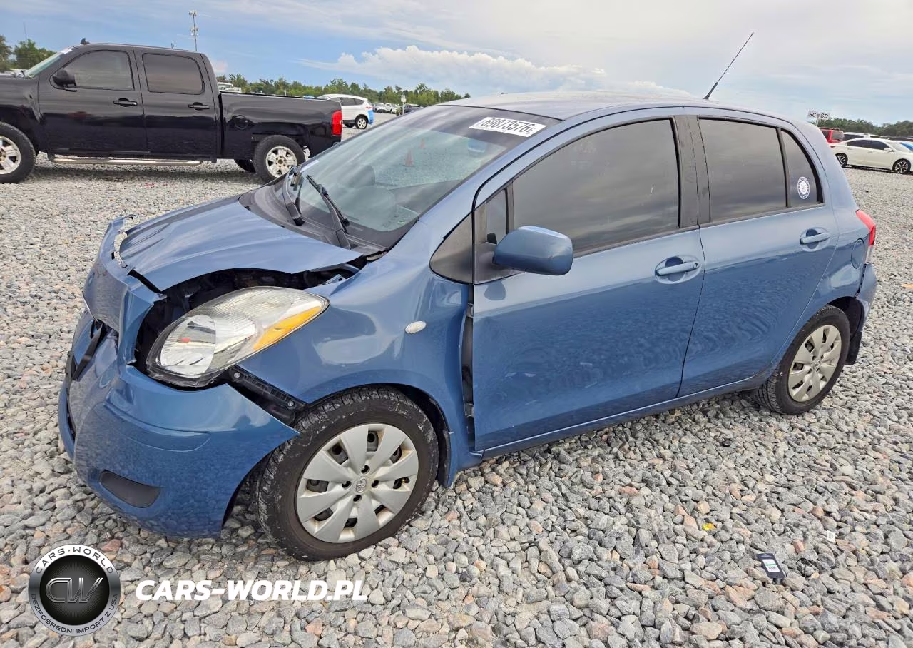 2009 Toyota Yaris Base VIN:JTDKT903X95249100 - 1
