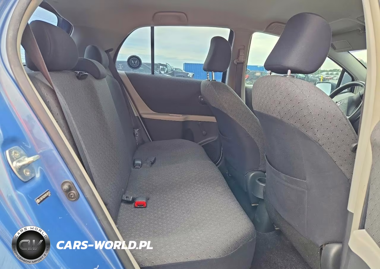 2009 Toyota Yaris Base VIN:JTDKT903X95249100 - 10