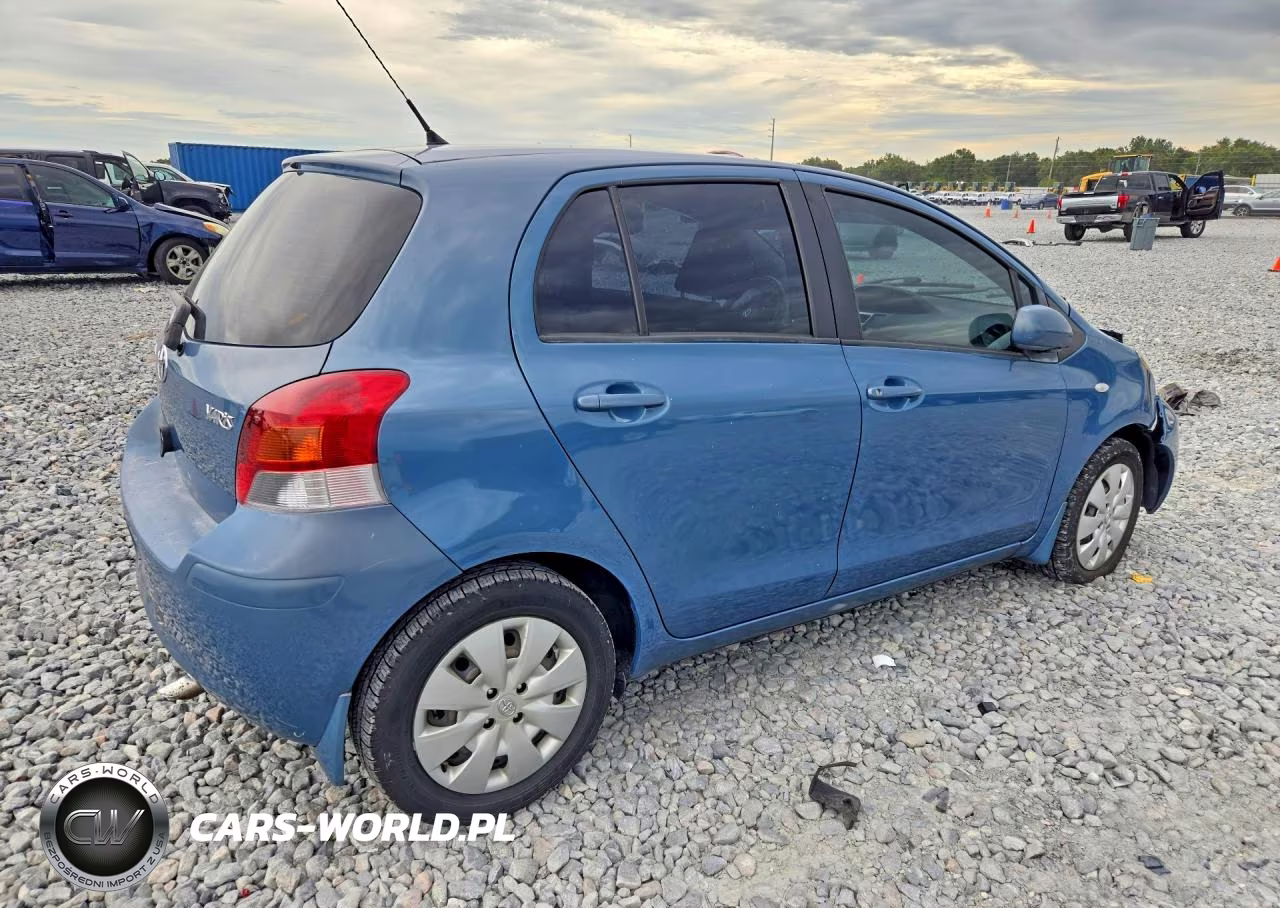 2009 Toyota Yaris Base VIN:JTDKT903X95249100 - 3