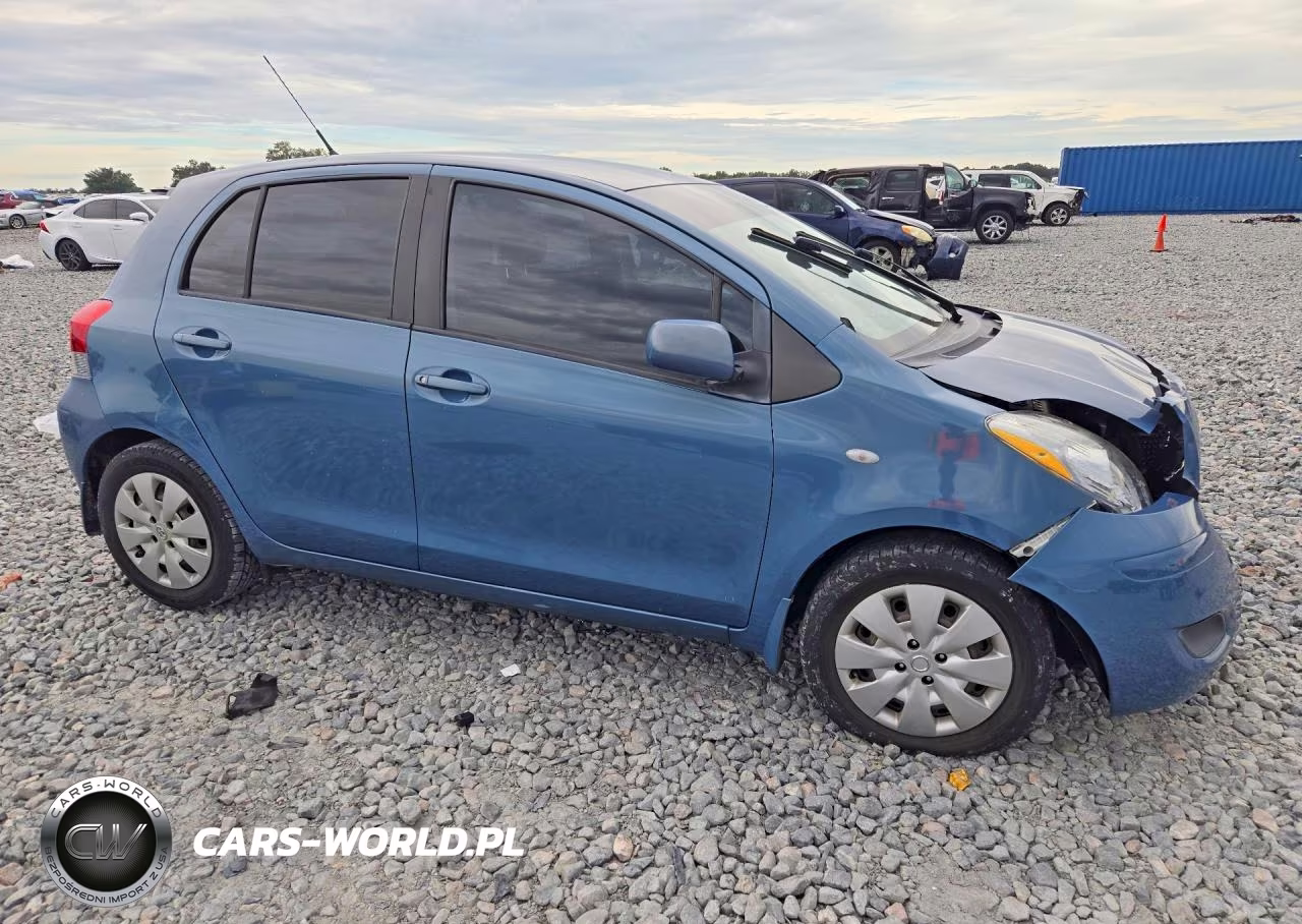 2009 Toyota Yaris Base VIN:JTDKT903X95249100 - 4