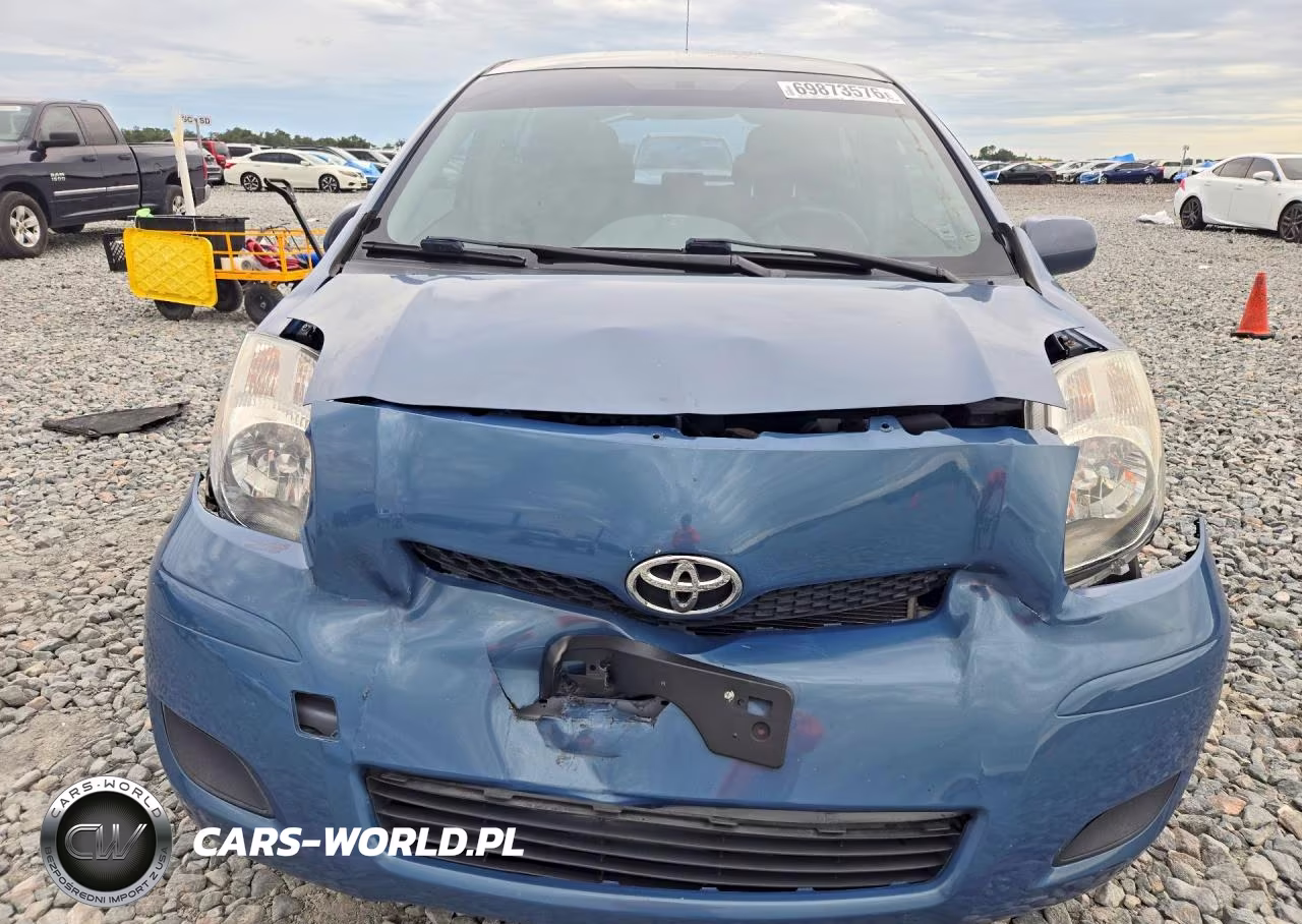 2009 Toyota Yaris Base VIN:JTDKT903X95249100 - 5