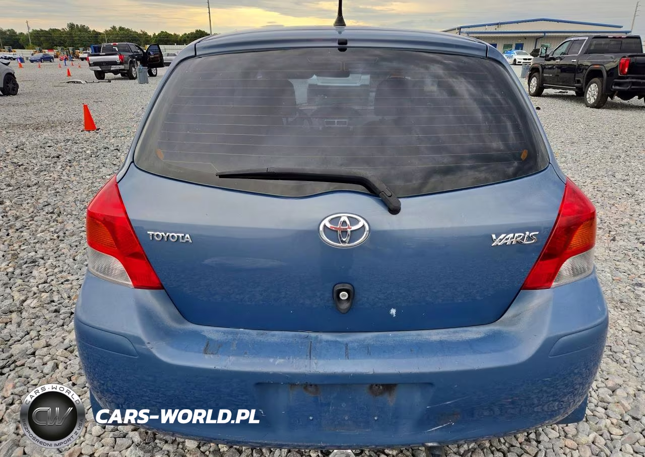 2009 Toyota Yaris Base VIN:JTDKT903X95249100 - 6