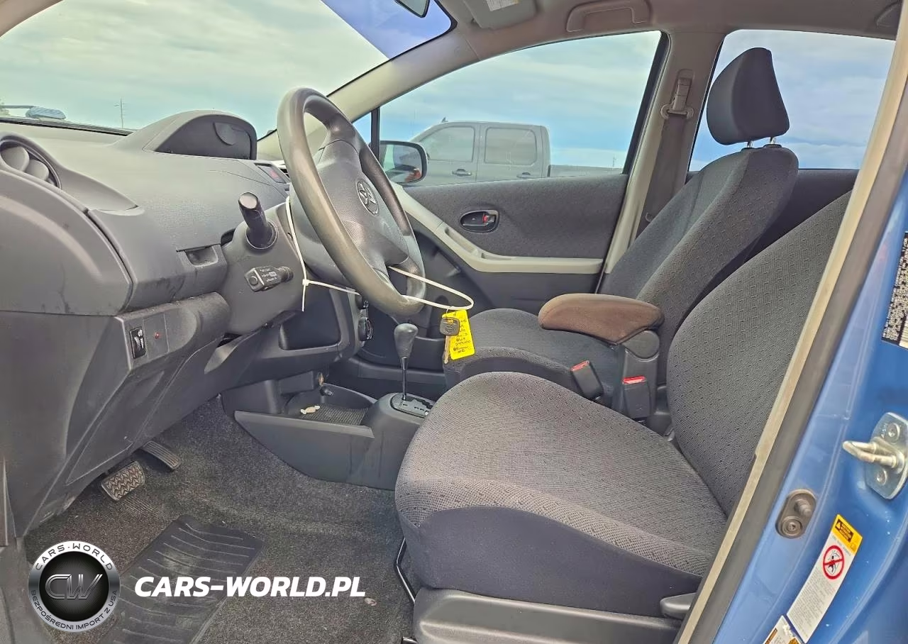 2009 Toyota Yaris Base VIN:JTDKT903X95249100 - 7