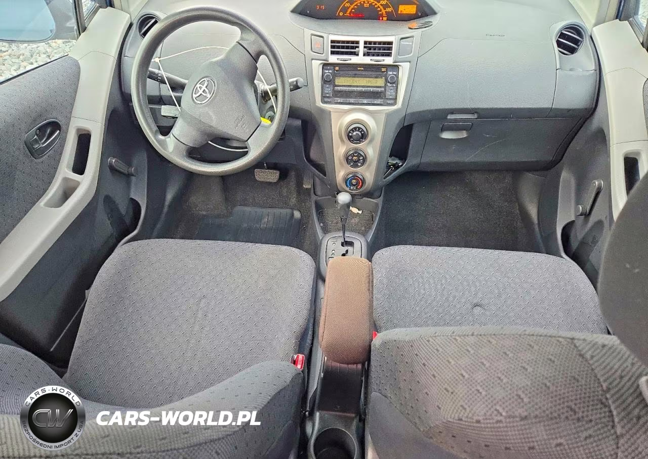 2009 Toyota Yaris Base VIN:JTDKT903X95249100 - 8