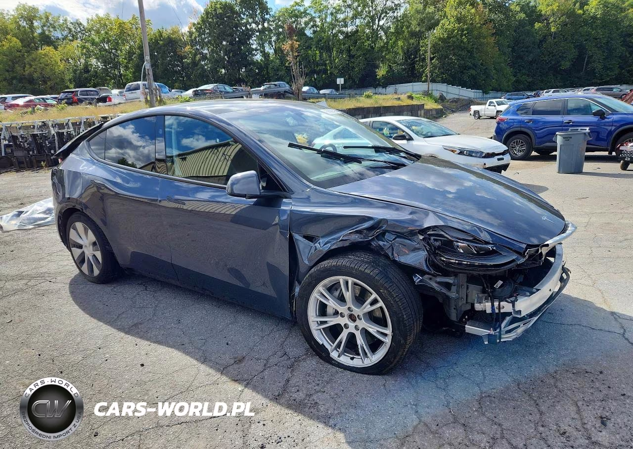 2023 Tesla Model Y VIN:7SAYGDEEXPA209302 - 4
