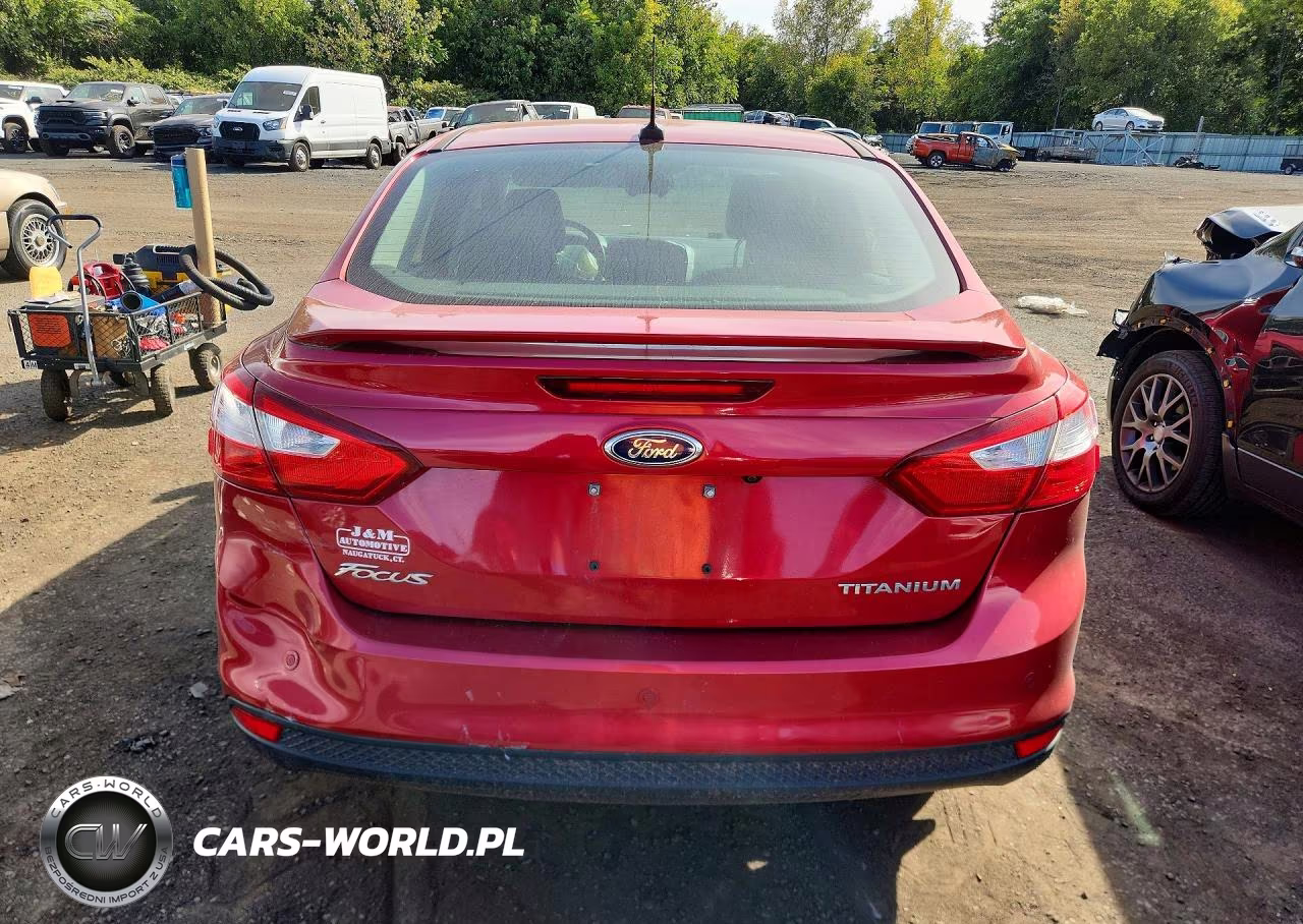 2012 Ford Focus Titanium VIN:1FAHP3J20CL219145 - 6