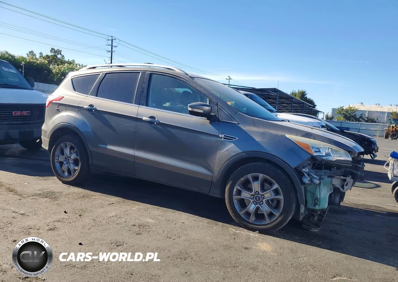 2014 Ford Escape Titanium VIN:1FMCU0J98EUA85079 - 4