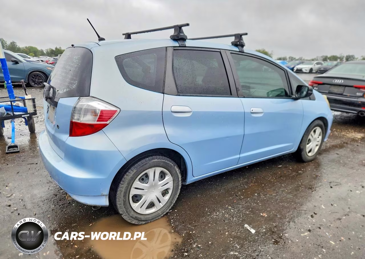 2009 Honda Fit VIN:JHMGE88239C006325 - 3