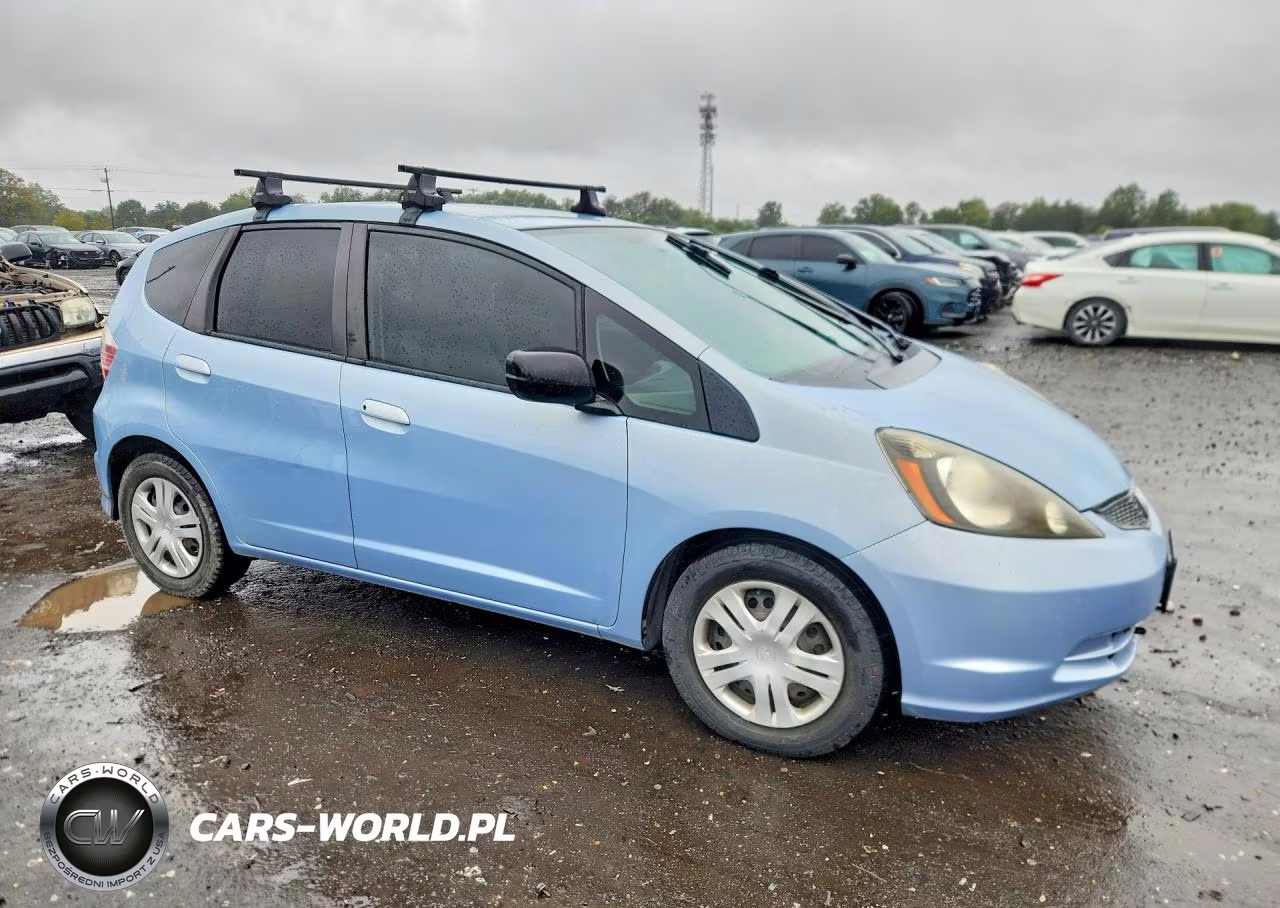 2009 Honda Fit VIN:JHMGE88239C006325 - 4