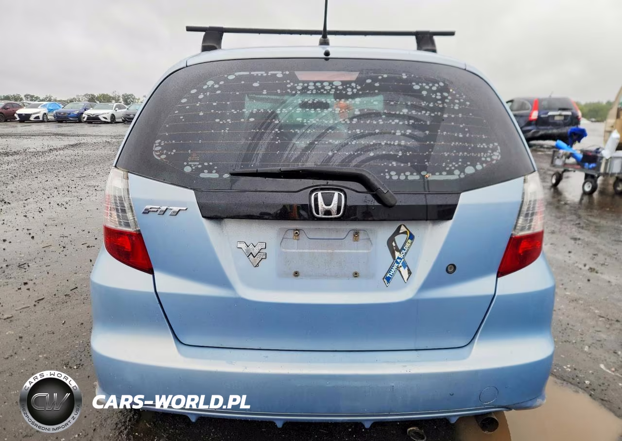 2009 Honda Fit VIN:JHMGE88239C006325 - 6