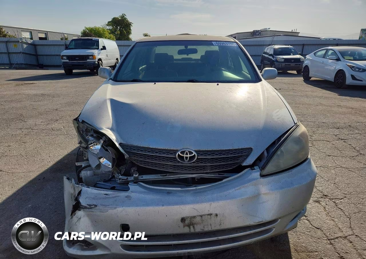 2004 Toyota Camry Le VIN:JTDBE32K040280499 - 5