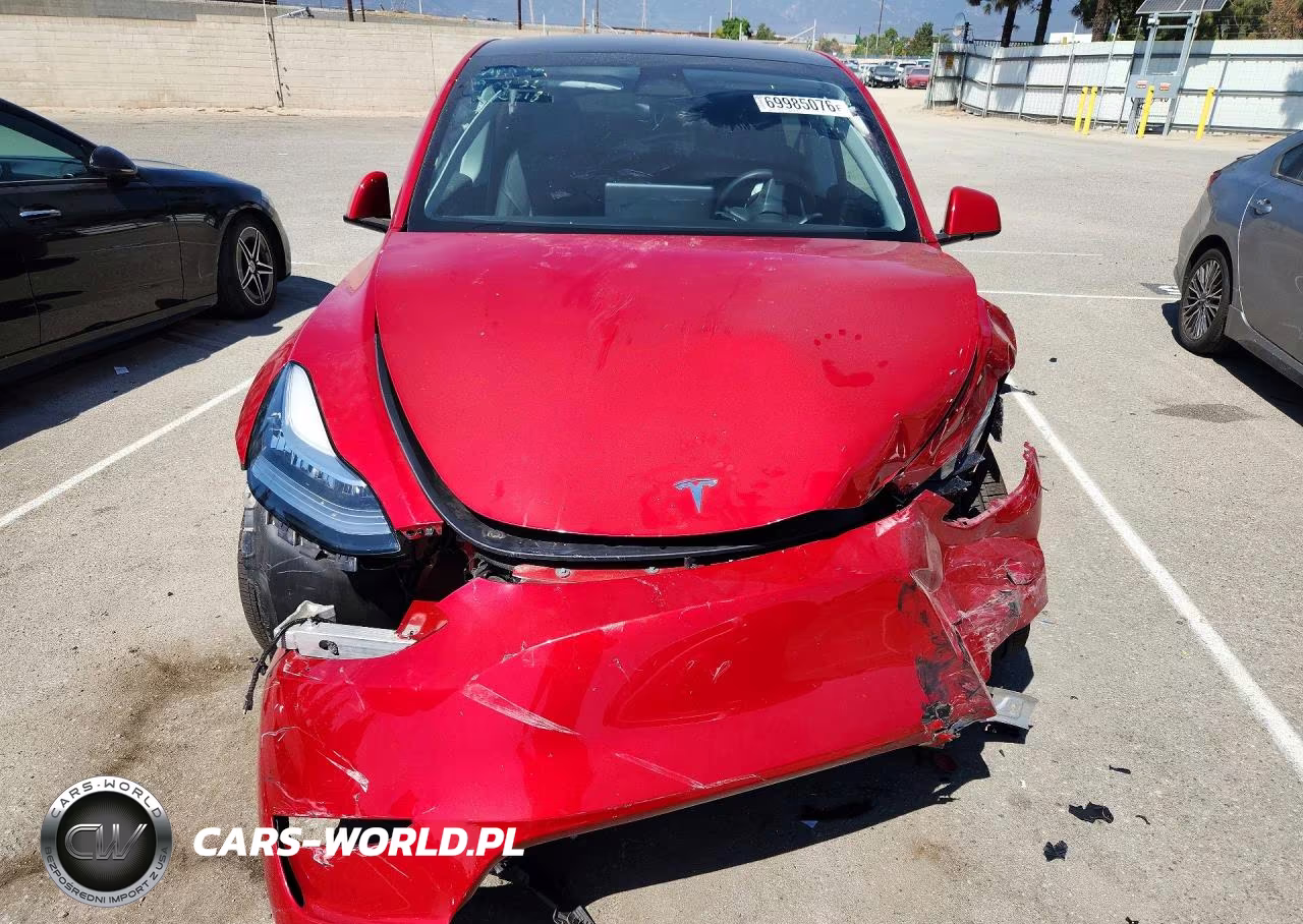 2023 Tesla Model Y VIN:7SAYGDEE9PA076340 - 5