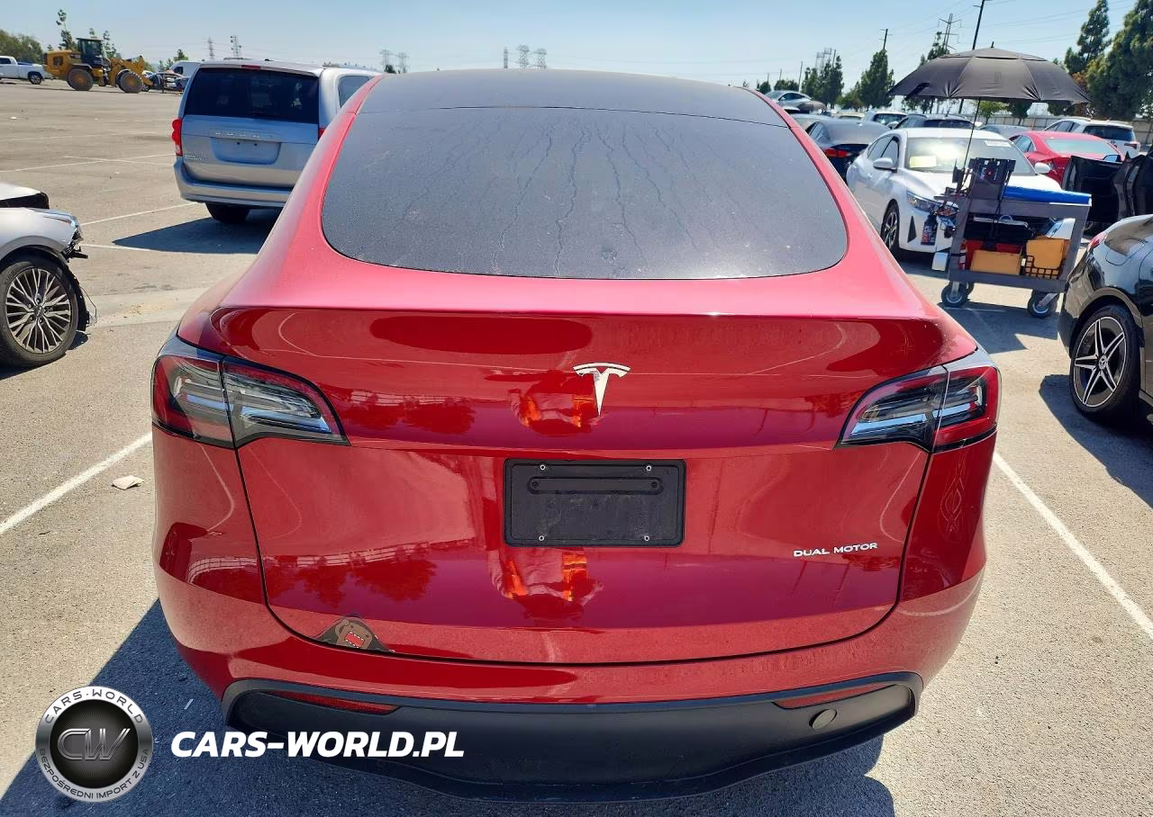2023 Tesla Model Y VIN:7SAYGDEE9PA076340 - 6