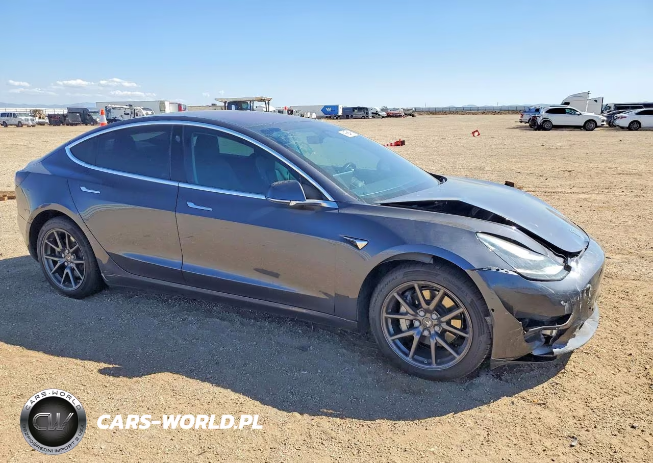 2018 Tesla Model 3 VIN:5YJ3E1EAXJF157592 - 4