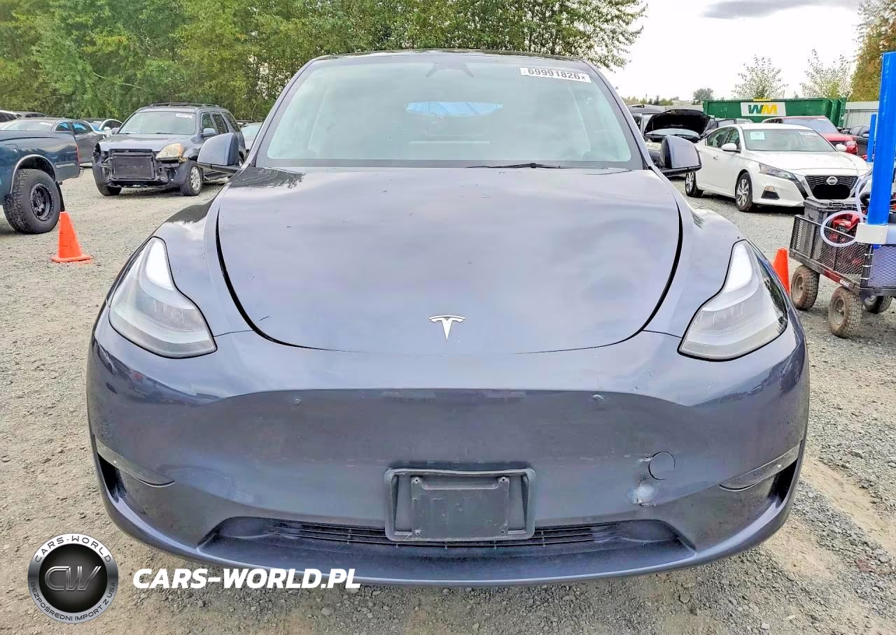 2023 Tesla Model Y VIN:7SAYGDEE6PA169557 - 5