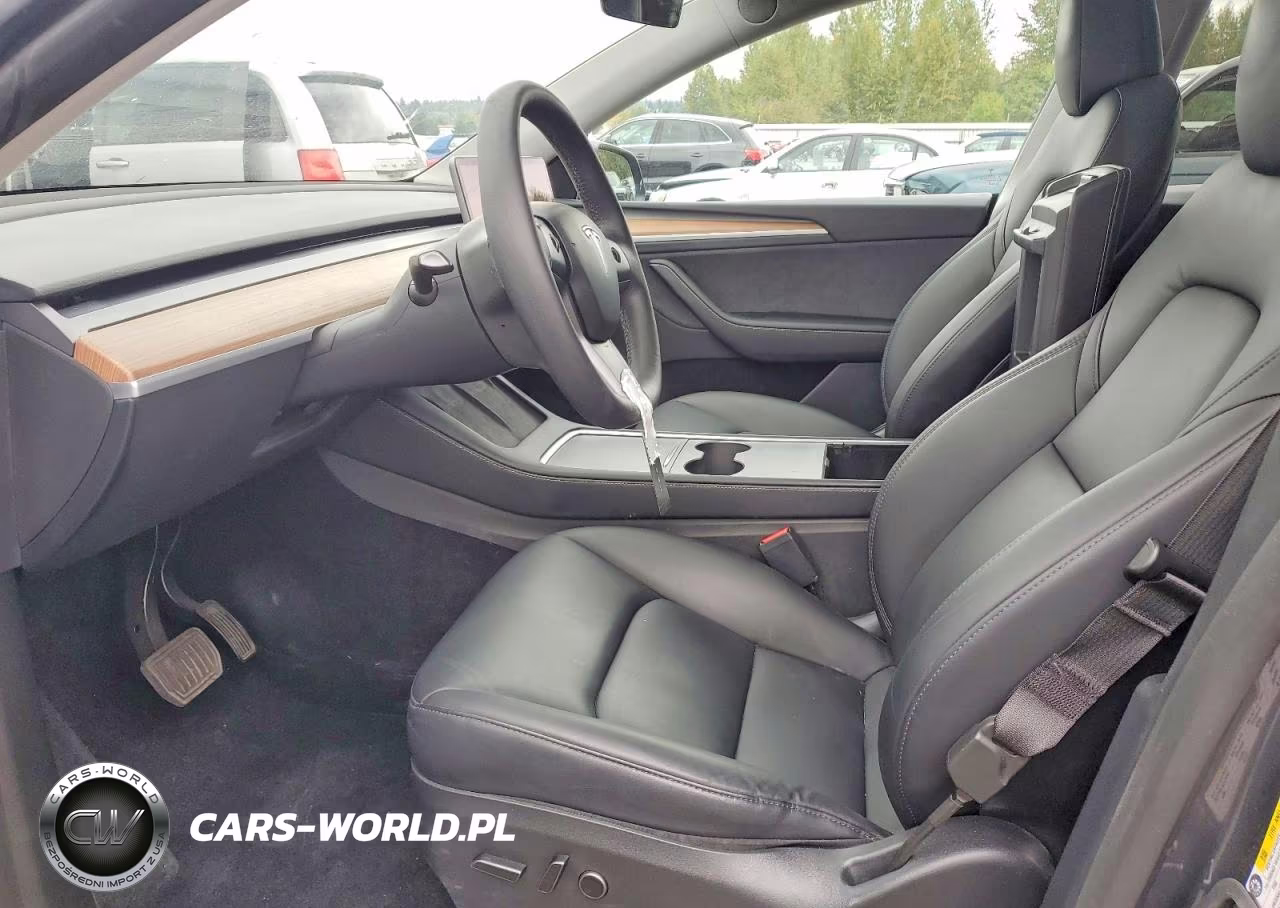 2023 Tesla Model Y VIN:7SAYGDEE6PA169557 - 7
