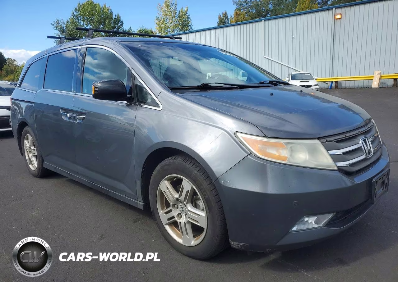 2011 Honda Odyssey Touring VIN:5FNRL5H92BB105061 - 4