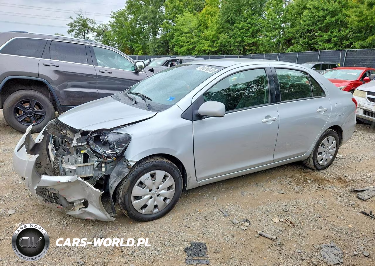 2009 Toyota Yaris Base VIN:JTDBT903394042358 - 1