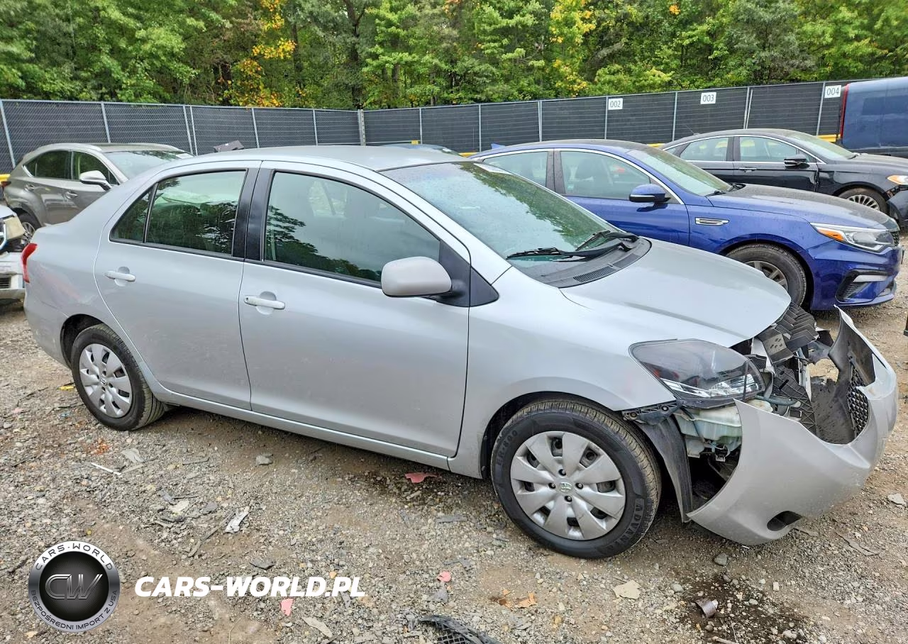 2009 Toyota Yaris Base VIN:JTDBT903394042358 - 4