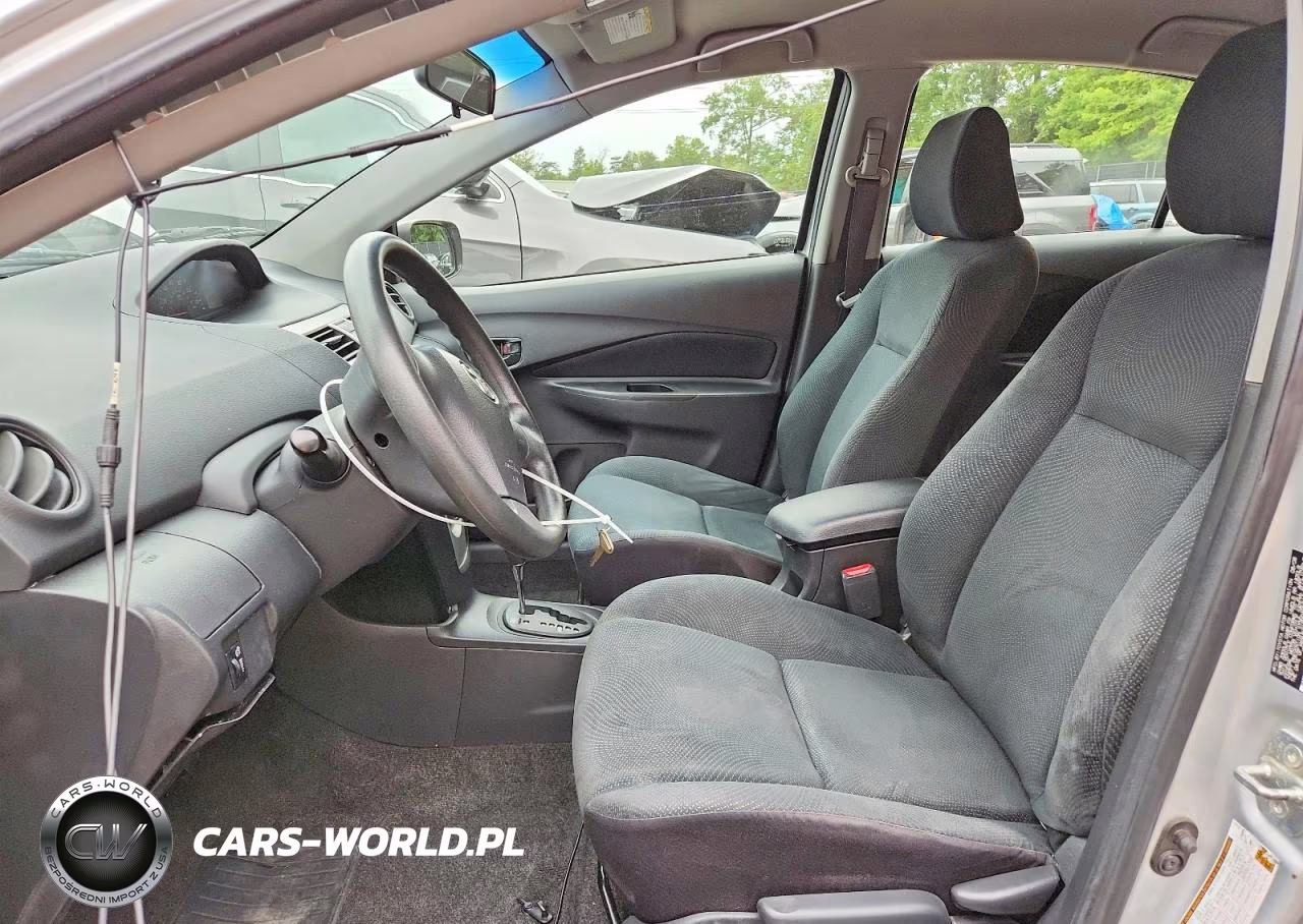 2009 Toyota Yaris Base VIN:JTDBT903394042358 - 7