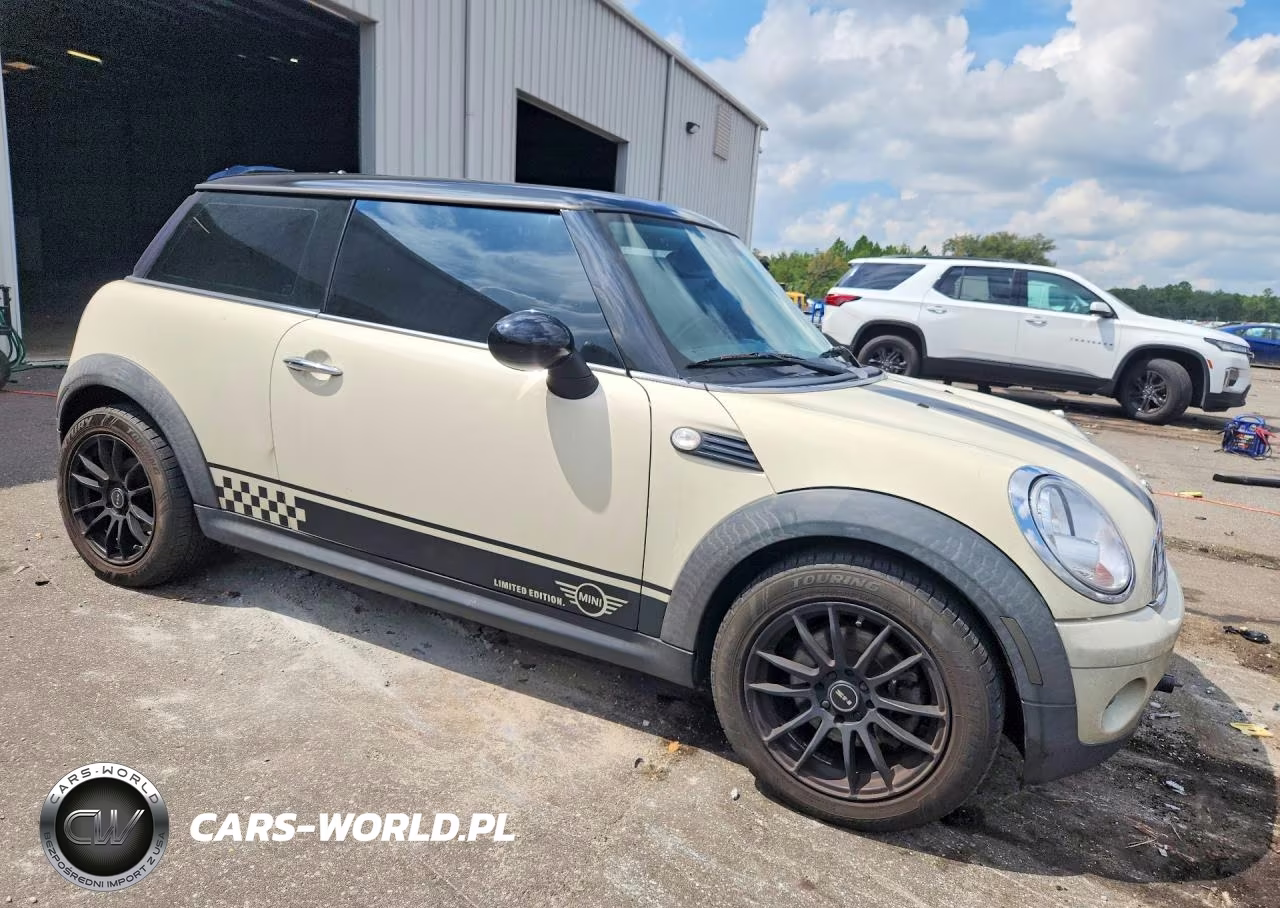 2009 Mini Cooper VIN:WMWMF33559TU75225 - 4