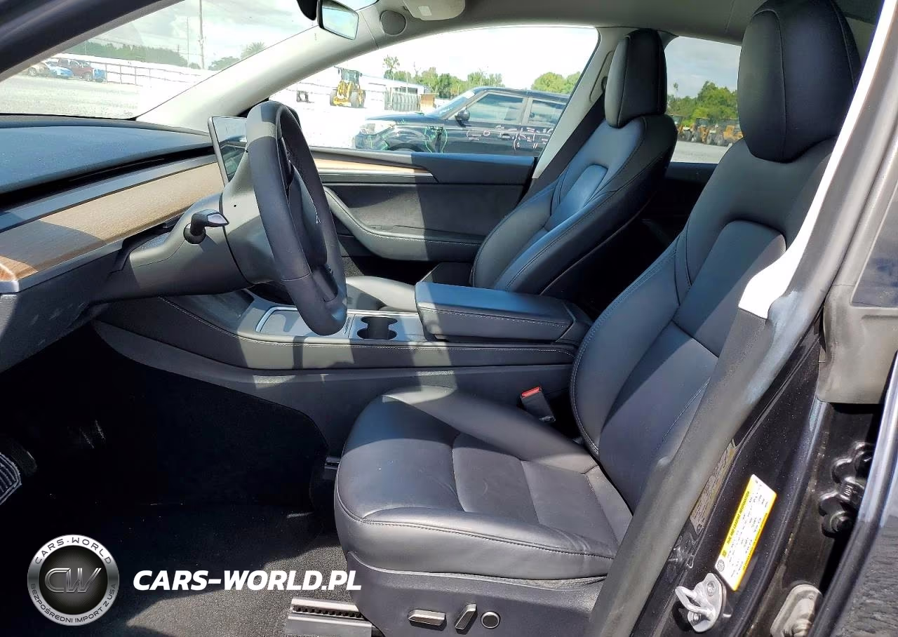 2024 Tesla Model Y VIN:7SAYGAEE4RF115467 - 7
