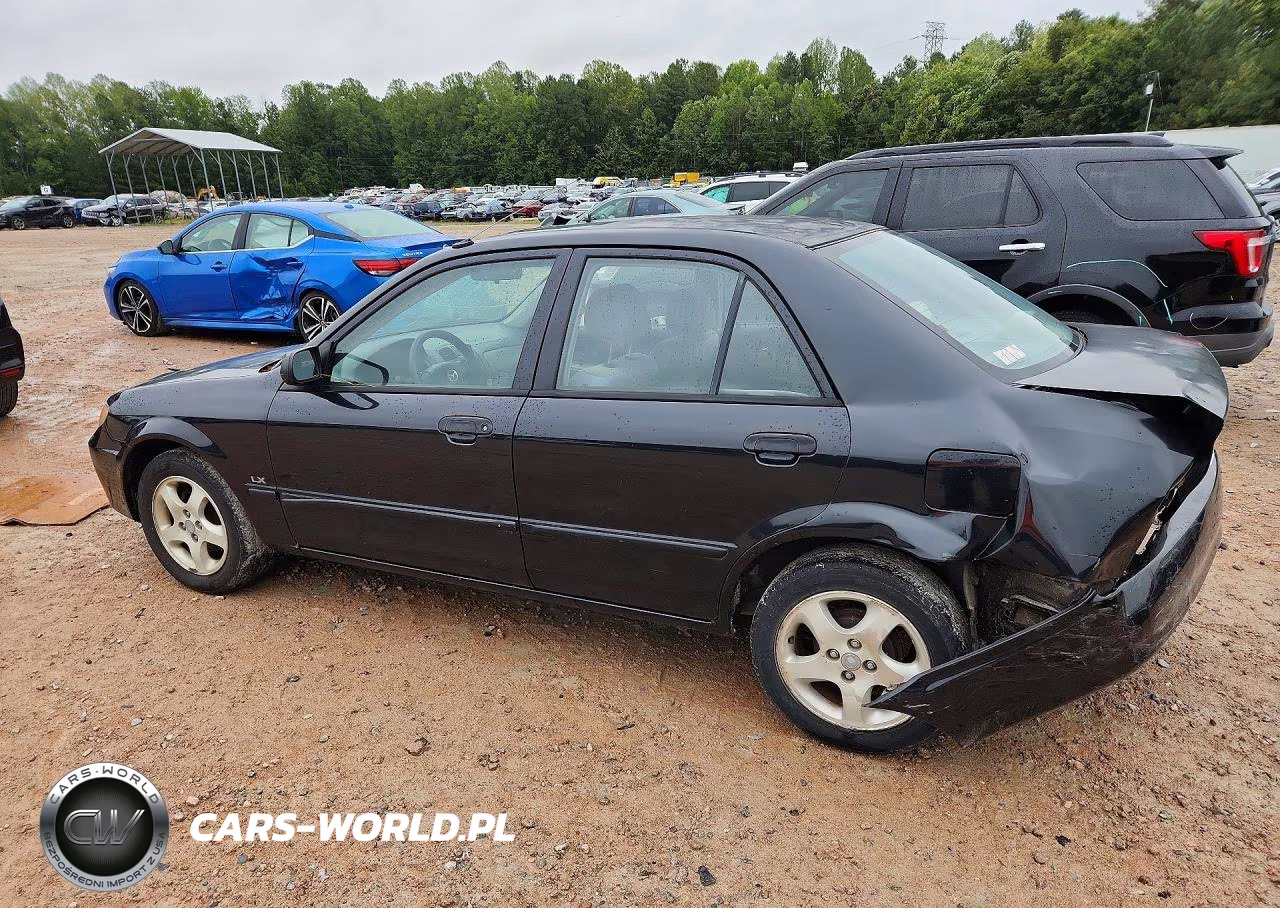2002 Mazda Protege Dx VIN:JM1BJ225720540703 - 2