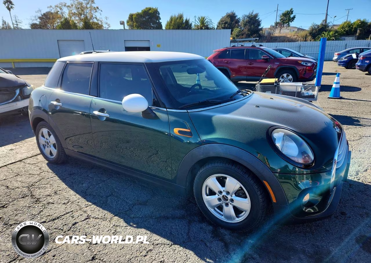 2015 Mini Cooper VIN:WMWXS5C59FT829182 - 4