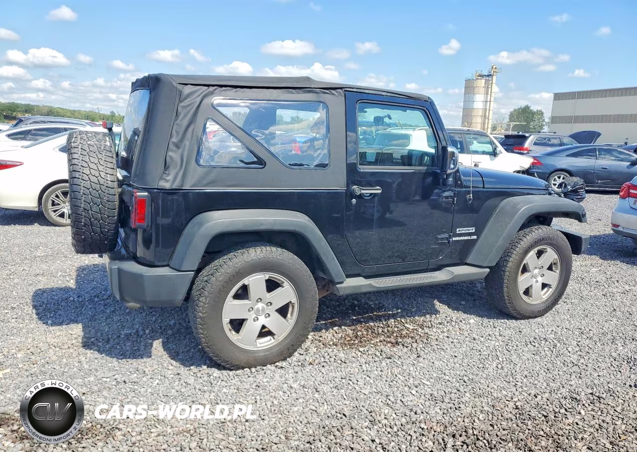2011 Jeep Wrangler Sport VIN:1J4AA2D18BL541597 - 3