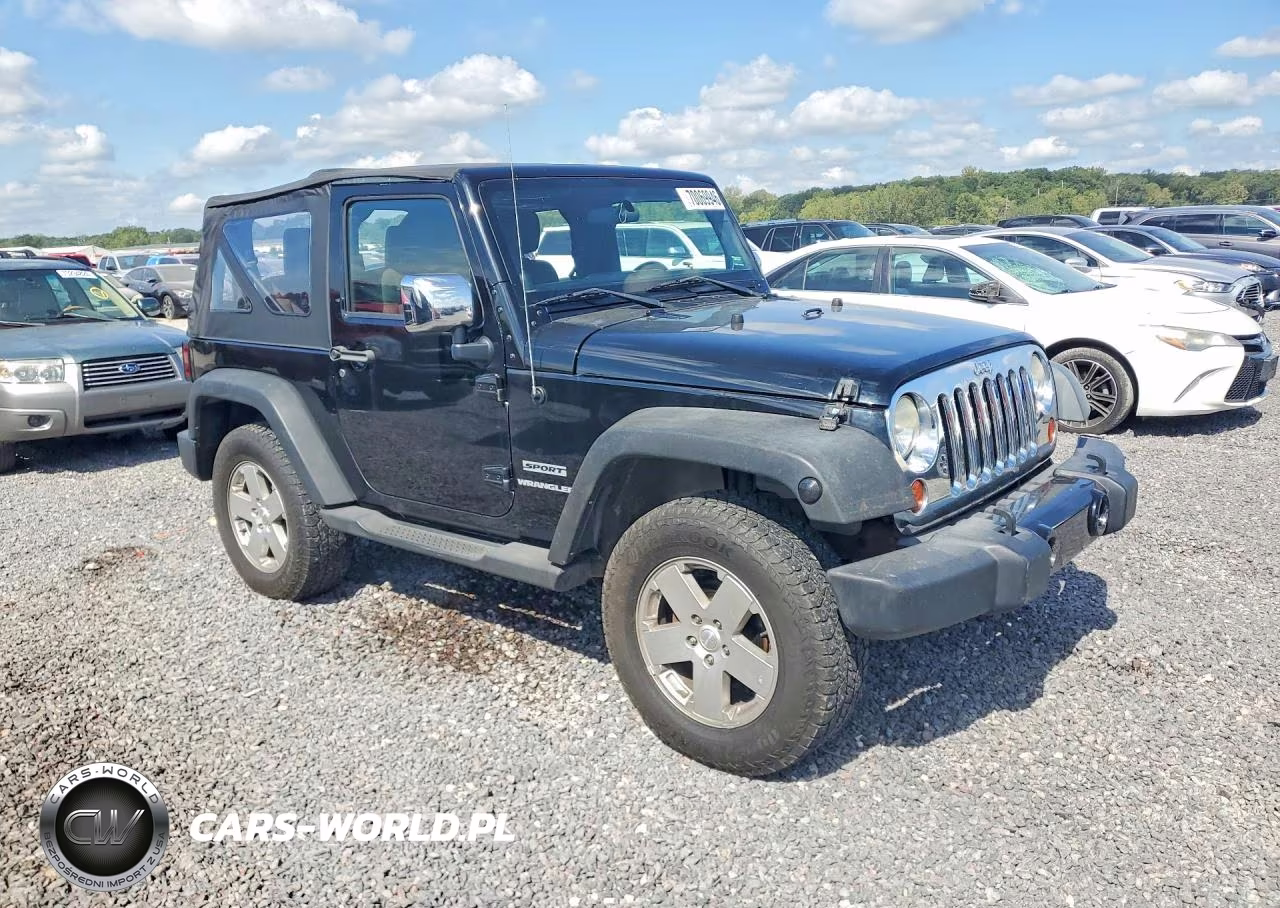2011 Jeep Wrangler Sport VIN:1J4AA2D18BL541597 - 4