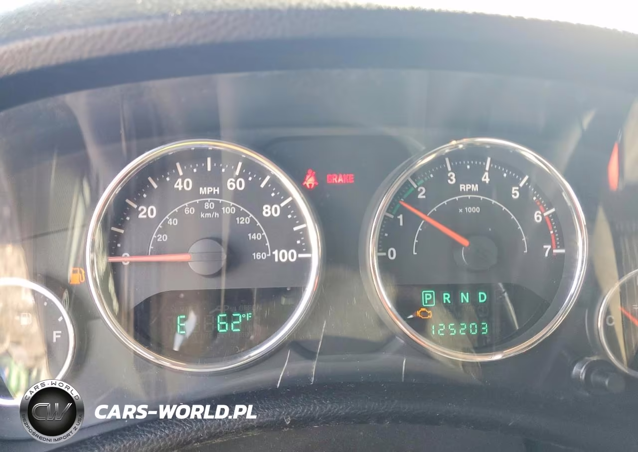 2011 Jeep Wrangler Sport VIN:1J4AA2D18BL541597 - 9