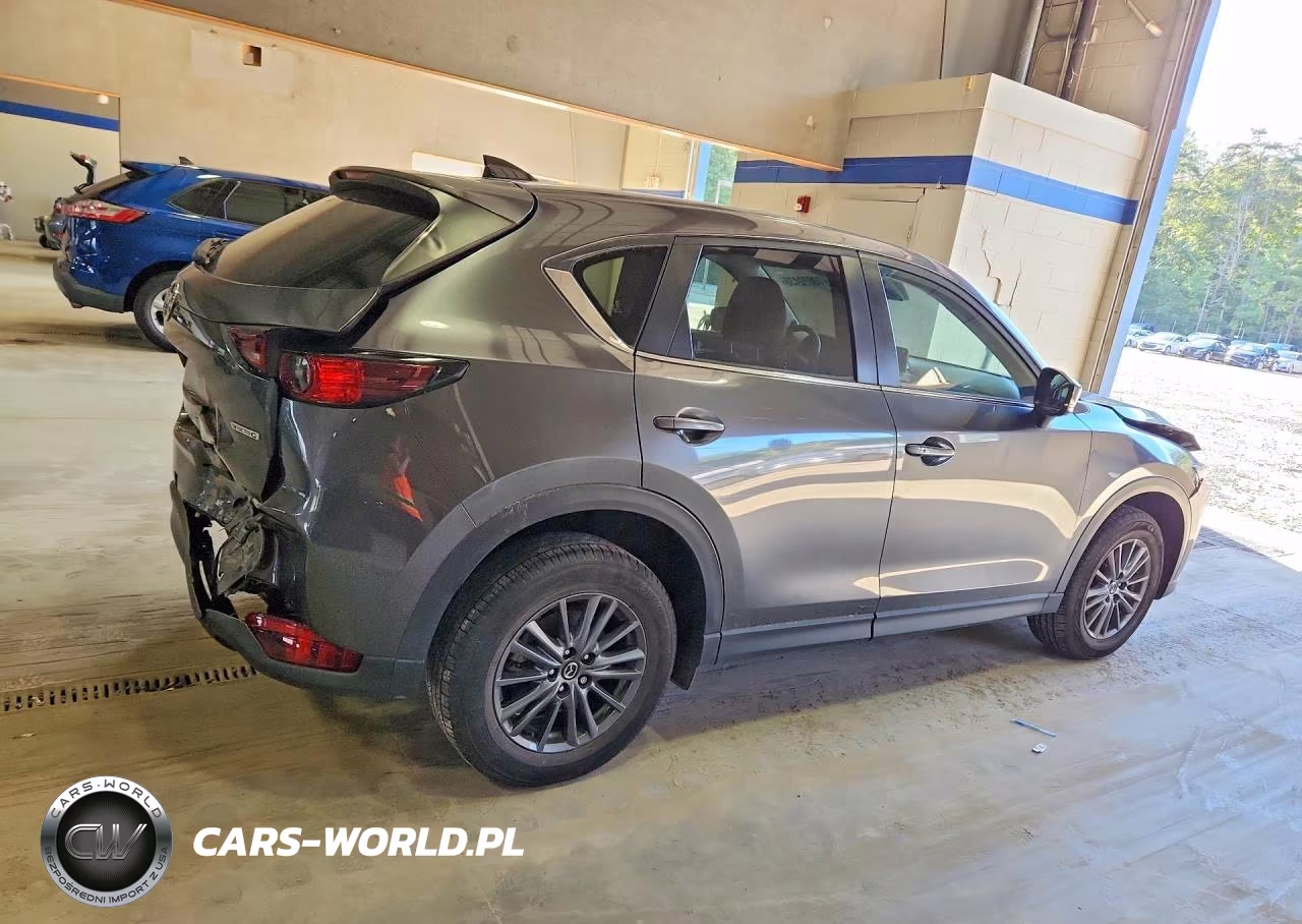 2021 Mazda Cx-5 Touring VIN:JM3KFBCM8M1385915 - 3